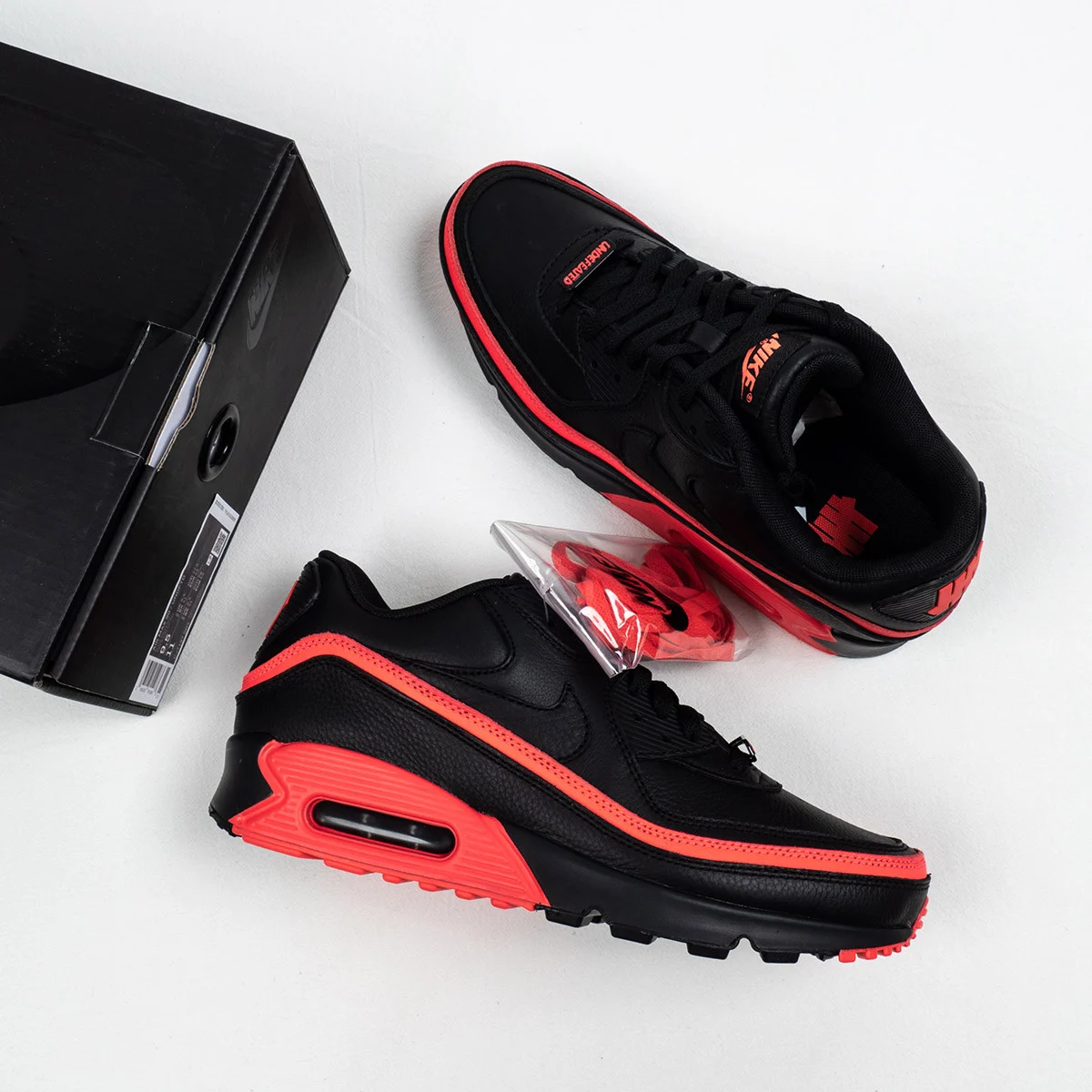Undefeated x Nike Air Max 90 Black Solar Red For Sale